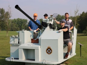 Swarms of wasps were on the Garrison Memorial Golf Course last week during the VETS annual golf tournament and this foursome perhaps decided to knock some of those dive bombing out of the air with this retired military anti-aircraft gun. They are Adam Mallon, left, Adam Biel, Brian Heerensperger and Daniel Johannesson. The tournament, played in 35 C weather supported Little Warriors, Valour Place and Habitat for Humanity.