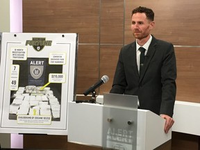 ALERT spokesman Mike Tucker speaks at a news conference about a major Alberta drug bust Friday Aug. 3, 2018.