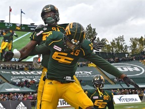 Edmonton Eskimos D'haquille Williams (81) celebrates his touchdown with Vidal Hazelton (15) against the Calgary Stampeders during CFL action at Commonwealth Stadium in Edmonton, September 8, 2018. Ed Kaiser/Postmedia