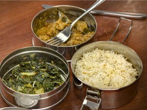 Tiffin refers to the metal containers for transporting hot South Asian food, as well as the practice of eating a light meal.