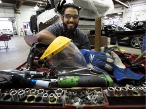Auto Body Repair Technician Muhammad Afzal, 20, poses for a photo at Modern Auto Body, 11330 154 St., in Edmonton Friday Sept. 7, 2018.
