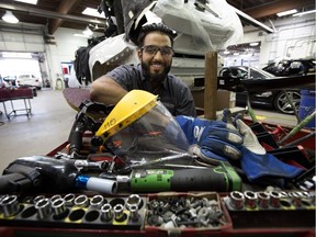 Auto body repair technician Muhammad Afzal, 20, works on a vehicle at Modern Auto Body, 11330 154 St., in Edmonton on Friday, Sept. 7, 2018. In the spring Afzal will compete in the WorldSkills Team Canada Selection Event in Halifax. The winner will be invited to join Team Canada to will represent the country at WorldSkills Kazan, 2019 in Russia.