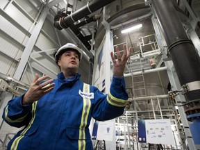 Simon Thomas, director of the Gold Bar Wastewater Treatment Plant, speaks to the media during a tour of the new nutrient recovery facility at the Edmonton Waste Management Centre on Wednesday, Sept. 12, 2018. The facility removes phosphorus and other nutrients from wastewater and turns it into fertilizer.