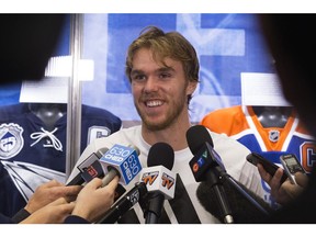 Connor McDavid speaks to the media during the opening day of the Edmonton Oilers training camp at Rogers Place on Thursday, Sept. 13, 2018.