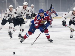 The Edmonton Oil Kings' Trey Fix-Wolansky (27) battles the Red Deer Rebels during first period WHL action at Rogers Place, in Edmonton Friday Sept. 21, 2018. Photo by David Bloom