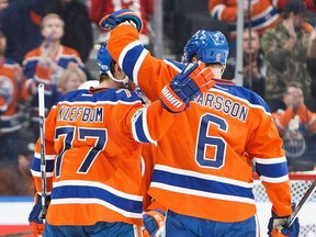 EDMONTON, AB - MARCH 4: Oscar Klefbom #77 and Adam Larsson #6 of the Edmonton Oilers celebrate Larsson's goal against the Detroit Red Wings on March 4, 2017 at Rogers Place in Edmonton, Alberta, Canada.