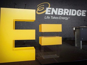 Enbridge company logos on display at the company's annual meeting in Calgary, Thursday, May 12, 2016.
