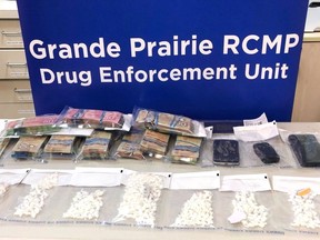 Grande Prairie RCMP seized 226 grams of cocaine and more than $85,000 in cash from a home and a vehicle in Grande Prairie on Friday, Sept. 14, 2018.