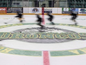 Players from team black skate down the ice during the first day of the Humboldt Broncos training camp at Elgar Petersen Arena in Humboldt, Sask. on Friday, August, 24, 2018.