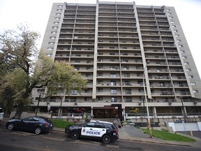 Edmonton Police and police tape is visible in the lobby of the Rossdale House, 9825 103 Street, apartment building, Wednesday morning Sept. 12, 2018. David Bloom/Postmedia