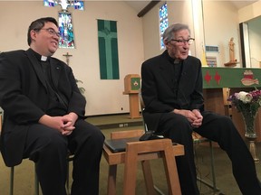 Fathers Frank Stempfle (right) and Andrew Leung speak to media after the final mass at St. Patrick Parish in Edmonton. The church at 11811 96 Street closed Sept. 30, 2018 after 70 years in the community. The church was allowed to stay open after nearly closing in 1998 for as long as Stempfle was pastor. He decided to retire this summer at age 91.