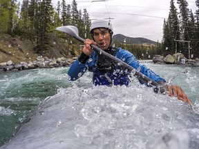 Darius Ramrattan paddles on a fast portion of the Kananaskis River in Kananaskis Country on April 23, 2016.