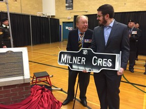 Stanley Milner, left, with his son Kevin Milner, at the dedication ceremony for Milner Crescent, named after the family, in the Village at Griesbach neighbourhood in Edmonton on Saturday, September 22, 2018. Photo Emma Graney