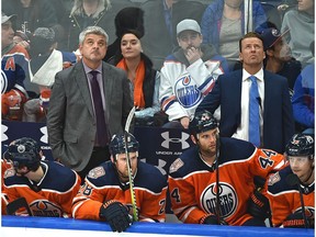 Edmonton Oilers head coach Todd McLellan (L) with assistant coach Glen Gulutzan playing the Vancouver Canucks during NHL pre-season action at Rogers Place in Edmonton, September 25, 2018.