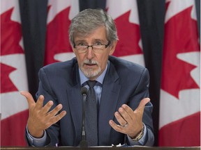Privacy commissioner Daniel Therrien responds to a question during a press conference after tabling his latest annual report, Tuesday September 27, 2016 in Ottawa. Privacy watchdogs from across the country are collectively calling on federal and provincial governments to force political parties to disclose any personal information they have collected and allow for independent oversight to ensure they are respecting the privacy of the electorate. File photo.