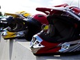 Helmets sit on a barricade at the Castrol Raceway in Nisku, Alberta.