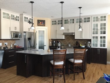 Before and after: Reface Magic extended these cabinets all the way to the ceiling, boosting storage space