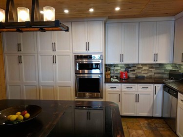 Before & After: With refacing you keep the basic structure of your cabinets, which saves money and time, while completely changing the look and feel of your kitchen. Want to change the layout of the inside? That’s doable too.