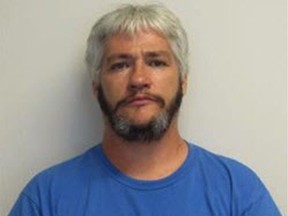 Michael Douglas Sheets, 48, is serving a sentence of 14 years and 6 months for manslaughter, arson, escape, and other offences. The Correctional Service of Canada says he is missing from the minimum security unit at Mission Institution. (Correctional Service of Canada)