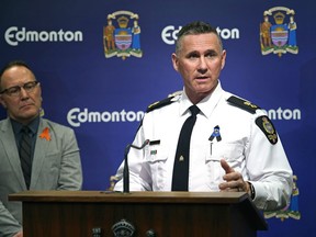 Insp. Derek McIntyre, right, of the Edmonton Police Service and Gord Cebryk, deputy city manager of city operations at the City of Edmonton, talk about transit safety at city hall on Friday, Sept. 28, 2018, two days after a knife attack on a city bus driver who was stabbed 13 times.