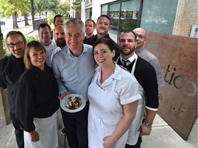 Restaurant owner Patrick Saurette recently hosted an event at The Marc to celebrate a storied restaurant, Il Portico, where many memories were shared. The restaurant's old sign is seen at right, and many former staff members showed up to work at the event.