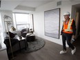 President of Katz Group Real Estate Glen Scott  walks through a two bedroom show suite in the SKY Residences at Ice District in Stantec Tower, in Edmonton Thursday Sept. 27, 2018. Show suite is on the 31st floor. Photo by David Bloom
