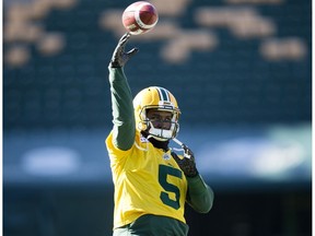 Kevin Glenn (5) takes part in an Edmonton Eskimos' team practice at Commonwealth Field, in Edmonton Wednesday Oct. 3, 2018.