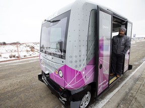 Operator Gerardo Moreno waits for passengers prior to a news conference to launch an Electric Autonomous Vehicle pilot project at Blatchford Tower, 29 Airport Rd., in Edmonton on Oct. 9, 2018.