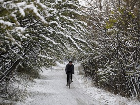 A cyclist makes their way along a bike path near 88 Avenue and 109 Street, in Edmonton Tuesday Oct. 9, 2018. Photo by David Bloom