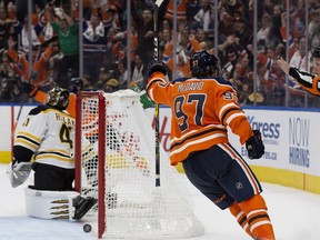 The Edmonton Oilers' Connor McDavid (97) celebrates the Oilers' overtime goal to beat the Boston Bruins 3-2 at Rogers Place, in Edmonton Thursday Oct. 18, 2018. Photo by David Bloom