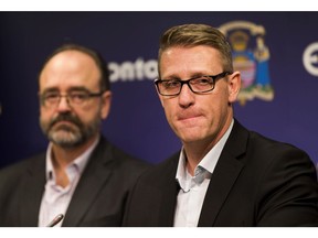 Todd Burge, left, chief financial officer for the City of Edmonton, and Adam Laughlin, deputy city manager, deliver Edmonton's 2019-22 capital budget on Thursday, Oct. 18, 2018.