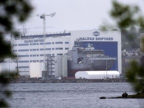 The Irving Shipbuilding facility is seen in Halifax on June 14, 2018. Canada's most-expensive military project is about to enter a critical new phase as the government is on the verge of picking its top design for the country's $60-billion fleet of new warships. Defence insiders say the government wants to select a design by the end of the month from among three options submitted by several of the largest defence and shipbuilding companies in the world. After that the government and Halifax-based Irving Shipbuilding, which will actually build the 15 new warships, will sit down with the selected bidder to hammer out the final cost and other details.