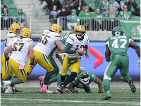 Edmonton Eskimos quarterback Mike Reilly runs the ball during first half CFL action against the Saskatchewan Roughriders, in Regina on Monday, Oct. 8, 2018.