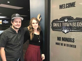 Pot shop owners Chris and Nicole Felgate in front of their store in Devon, Alta.