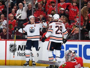 Connor McDavid #97 of the Edmonton Oilers reacts after scoring the game winning goal in overtime against the Chicago Blackhawks at the United Center on October 28, 2018 in Chicago, Illinois. (Photo by Bill Smith/NHLI via Getty Images)