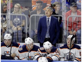 Edmonton Oilers coach Todd McLellan looks up during an exhibiton game against the Koelner Haie (Cologne Sharks) in Cologne, Germany, Wednesday, Oct. 3, 2018.