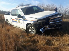 An RCMP vehicle was damaged by a fleeing car at a rural property near St. Paul on Oct. 24, 2018.