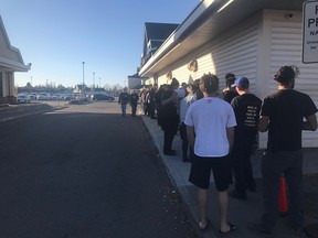 Line up outside Nova Cannabis at Namao located at 16616 95 St. NW Edmonton on Saturday, Oct. 20, 2018.
