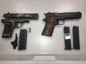 A 60-year-old man is facing charges after two handguns discovered in a checked suitcase bound for Beruit, Lebanon, were seized by Edmonton International Airport RCMP.