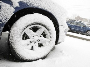 Winter tires, such as these freshly installed on a truck, can make city and highway winter driving safer. But should they be mandatory for Edmonton or Alberta drivers?