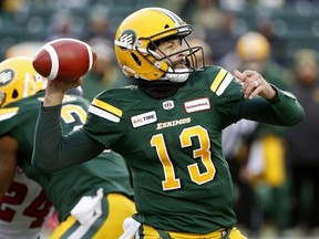 Edmonton Eskimos quarterback Mike Reilly looks for a receiver during CFL game action against the Ottawa Redblacks in Edmonton on Saturday, Oct. 13, 2018.