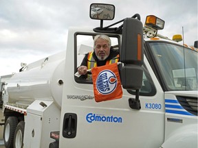 Claudio Padovan prepares to leave Edmonton is his truck Tuesday (October 2, 2018) evening. A work crew of 60 left Edmonton enroute to Calgary with 30 snow plows to help the City of Calgary with snow removal after a massive dump of snow hit Calgary on October 2, 2018.