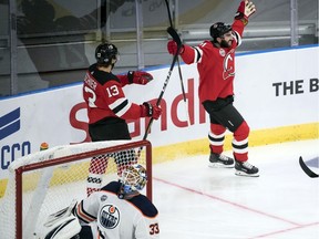 New Jersey Devils' Kyle Palmieri celebrates scoring during the season-opening NHL Global Series hockey match between Edmonton Oilers and New Jersey Devils at Scandinavium in Gothenburg, Sweden, Saturday, Oct. 6, 2018,