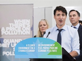 Prime Minister Justin Trudeau speaks to the media and students at Humber College regarding his government's new federally imposed carbon tax in Toronto on Tuesday, Oct. 23, 2018.