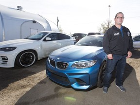 EPS Auto Theft Unit Det. Mark Kassian with several of the recovered vehicles from a VIN cloning operation on Thursday, Oct. 4, 2018, in Edmonton.