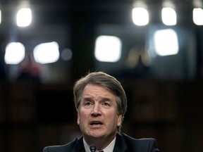 In this Sept. 4, 2018 photo, President Donald Trump's then Supreme Court nominee Judge Brett Kavanaugh, speaks before the Senate Judiciary Committee on Capitol Hill in Washington. Just 1 in 4 people think Brett Kavanaugh was completely honest during his pivotal testimony last month to the Senate Judiciary Committee. That's according to a poll by The Associated Press-NORC Center for Public Affairs Research.