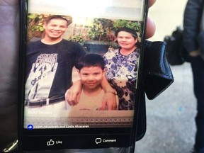 Ricky Massin Cenabre, pictured with his son John Cedric Cenabre and fiancé Editha Alcazaren-Cenabre, prior to his departure from the Philippines for Canada, where he was shot and killed while working in an Edmonton convenience store on Dec. 18, 2015.