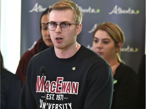 Council of Alberta University Students chairman, Andrew Bieman speaks after Minister of Advanced Education Marlin Schmidt announced bill 19 that was introduced Monday to cap post-secondary education tuition in Edmonton, October 29, 2018.