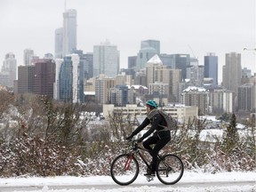 A cyclist makes their way along Saskatchewan Drive near 109 Street, in Edmonton Tuesday Oct. 9, 2018.