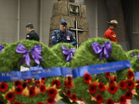 Members of the Canadian military and RCMP stand honour guard during the Remembrance Day Service at the University of Alberta's Van Vliet Centre, in Edmonton Sunday Nov. 11, 2018.